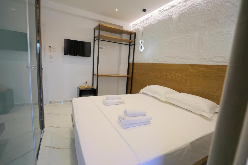 Postel nebo postele na pokoji v ubytování Hotel Golden Oak