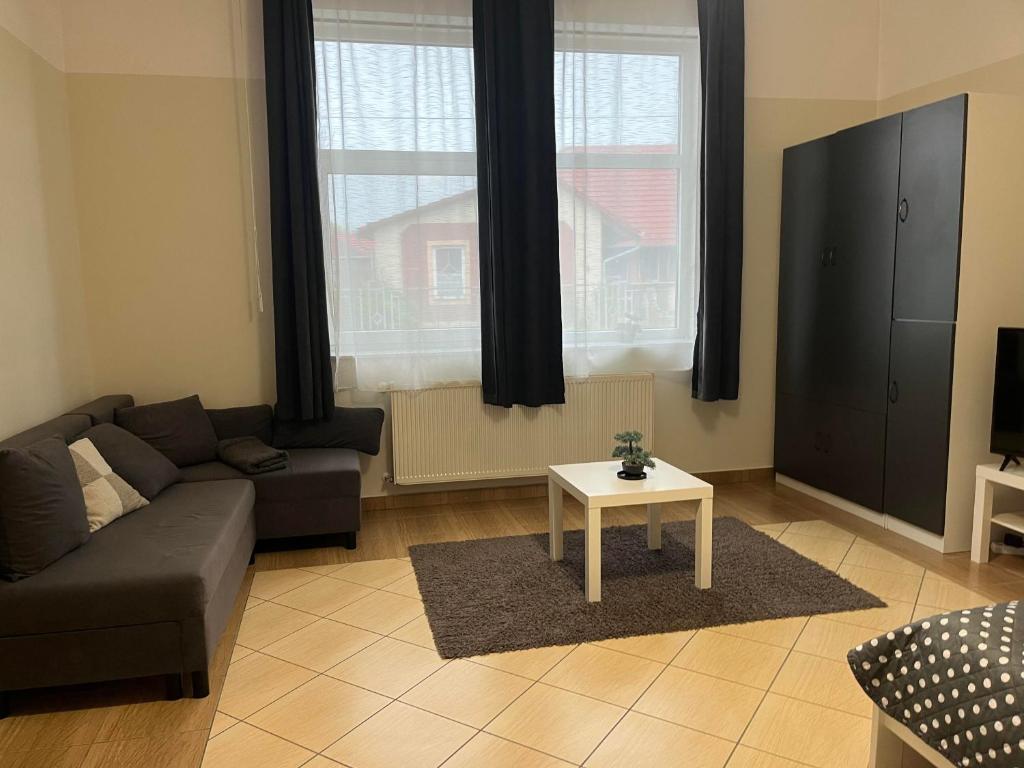 Posezení v ubytování Idill Apartmanház B&B