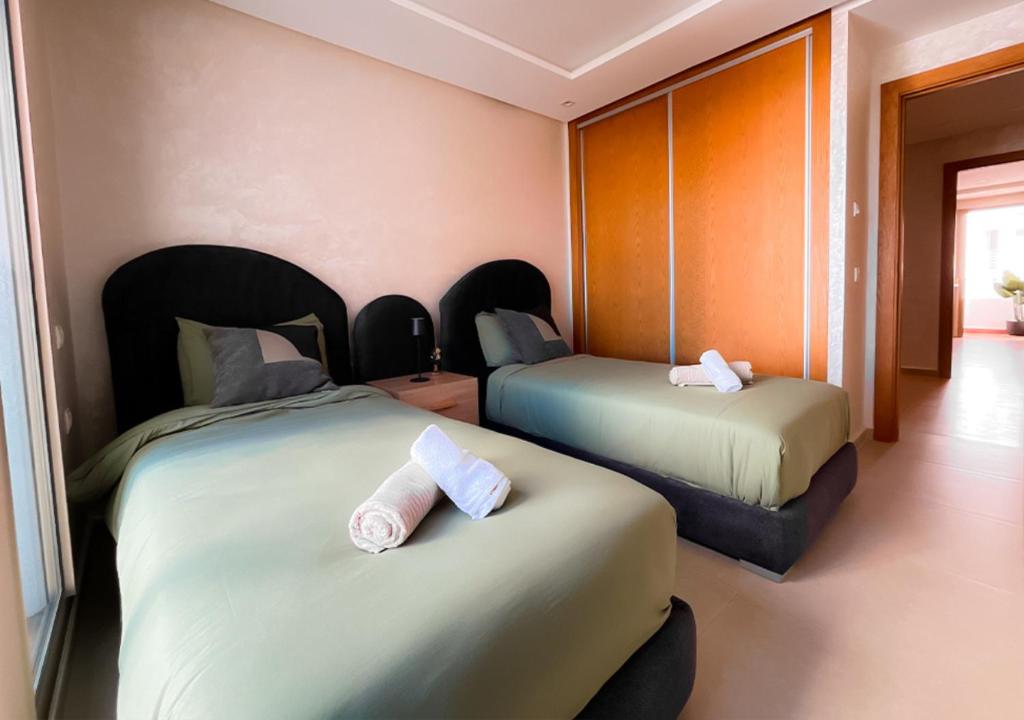 Postel nebo postele na pokoji v ubytování Harmonie Kénitra Grand Appartement 3 Chambres Tout Confort