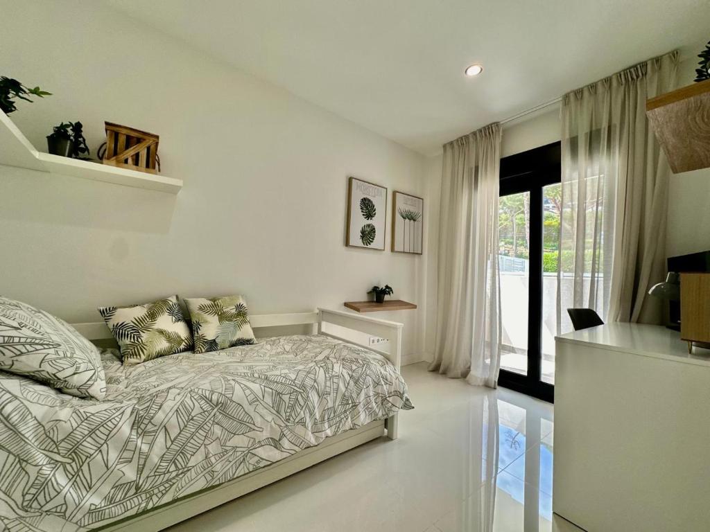 TV a/nebo společenská místnost v ubytování La Paloma Seaview Apartment