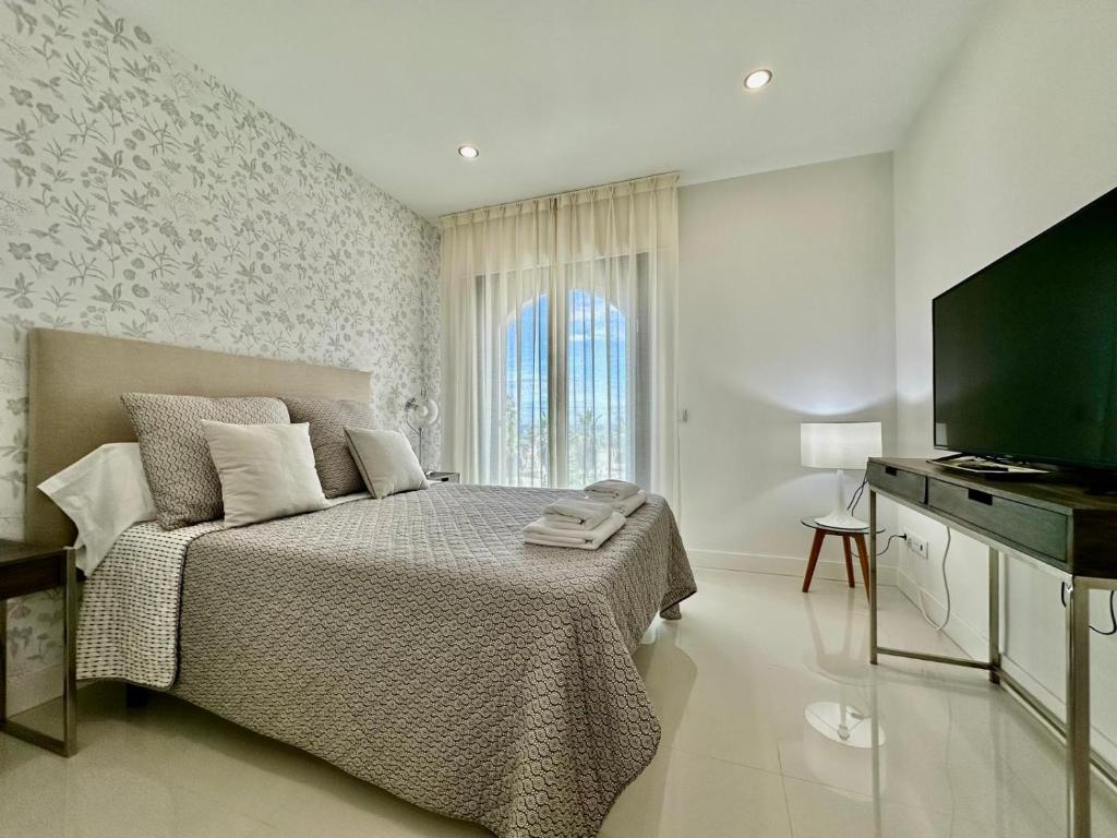 TV a/nebo společenská místnost v ubytování La Paloma Seaview Apartment