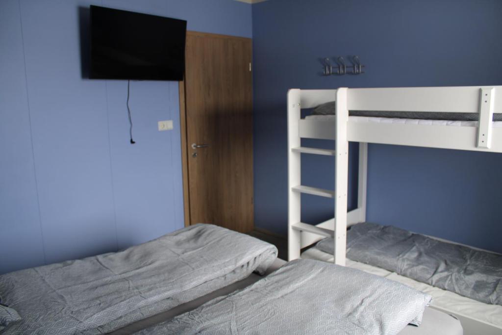 Postel nebo postele na pokoji v ubytování Árbakki-Guesthouse near Egilsstaðir
