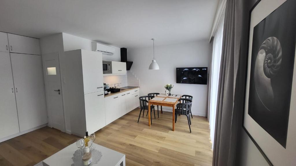 Kuchyň nebo kuchyňský kout v ubytování Apartament Stegna Baltic Park