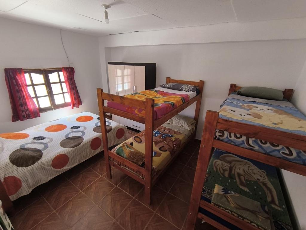 Postel nebo postele na pokoji v ubytování Hostel VERBENITA