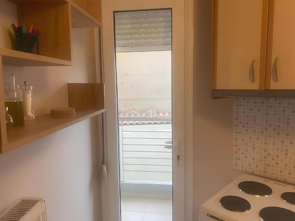 Kuchyň nebo kuchyňský kout v ubytování Emvelia Suites