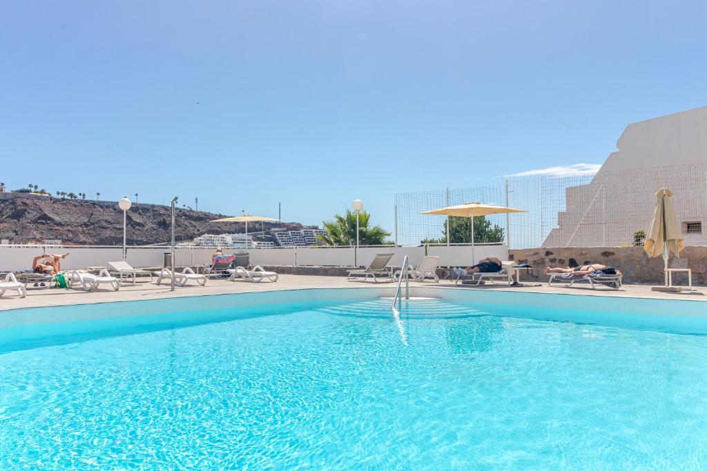 Bazén v ubytování Apartamento Arimar Sunset nebo v jeho okolí