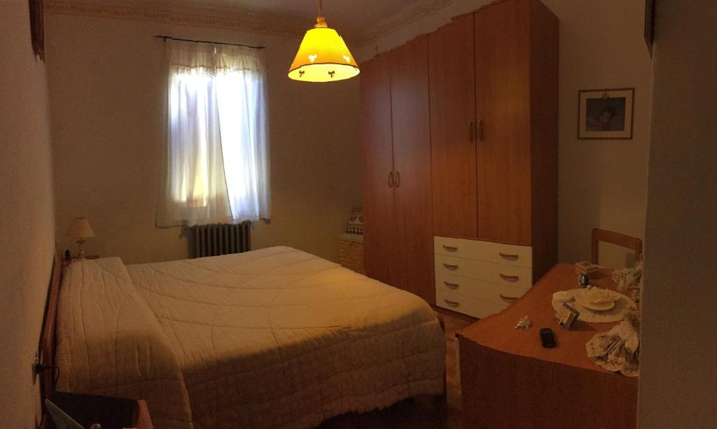 Postel nebo postele na pokoji v ubytování Albergo Ristorante La Selva