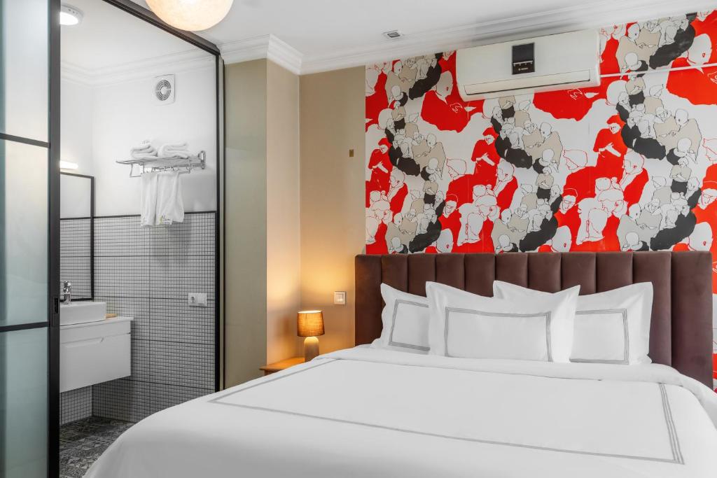 Postel nebo postele na pokoji v ubytování Elea Old Tbilisi Hotel