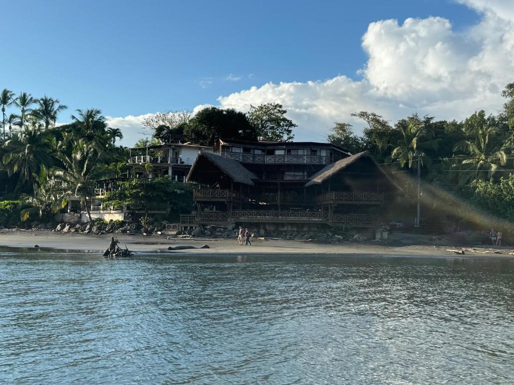 a building on the beach with a water hose at Costa Catalina in Santa Catalina