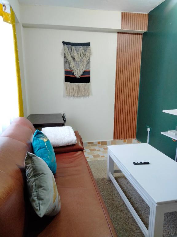 Postel nebo postele na pokoji v ubytování Nanyuki Cozy Haven