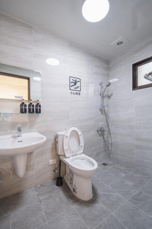 Koupelna v ubytování Shishi Homestay
