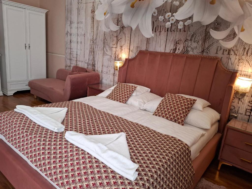 Postel nebo postele na pokoji v ubytování Kék Lagúna Wellness Apartmanok