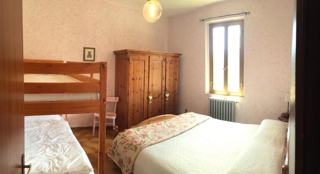 Postel nebo postele na pokoji v ubytování Albergo Ristorante La Selva
