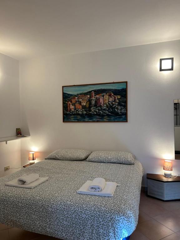 Postel nebo postele na pokoji v ubytování La Casetta