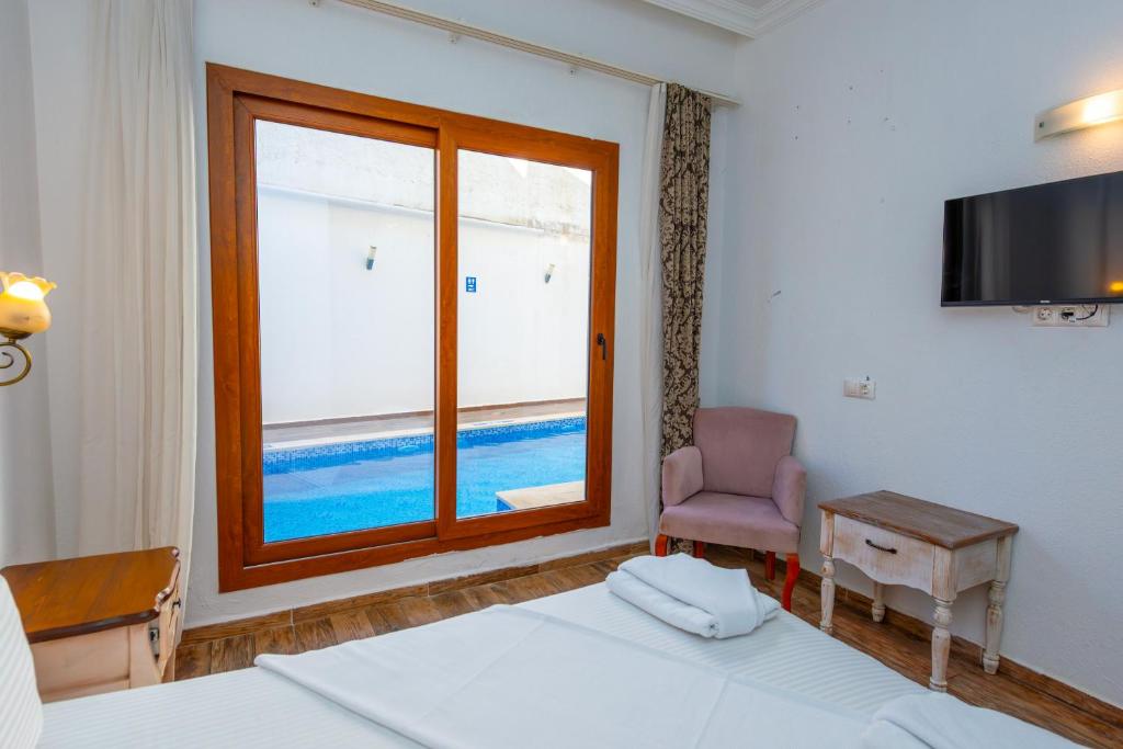 Bazén v ubytování Cennet Life Hotel nebo v jeho okolí