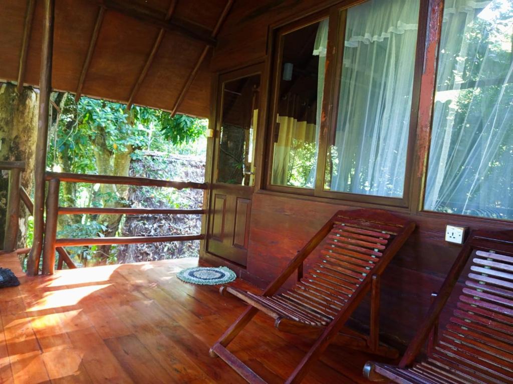 Balkón nebo terasa v ubytování Jungle Face Inn