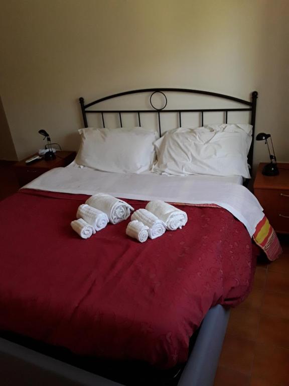 Postel nebo postele na pokoji v ubytování L'Aragosta Guesthouse