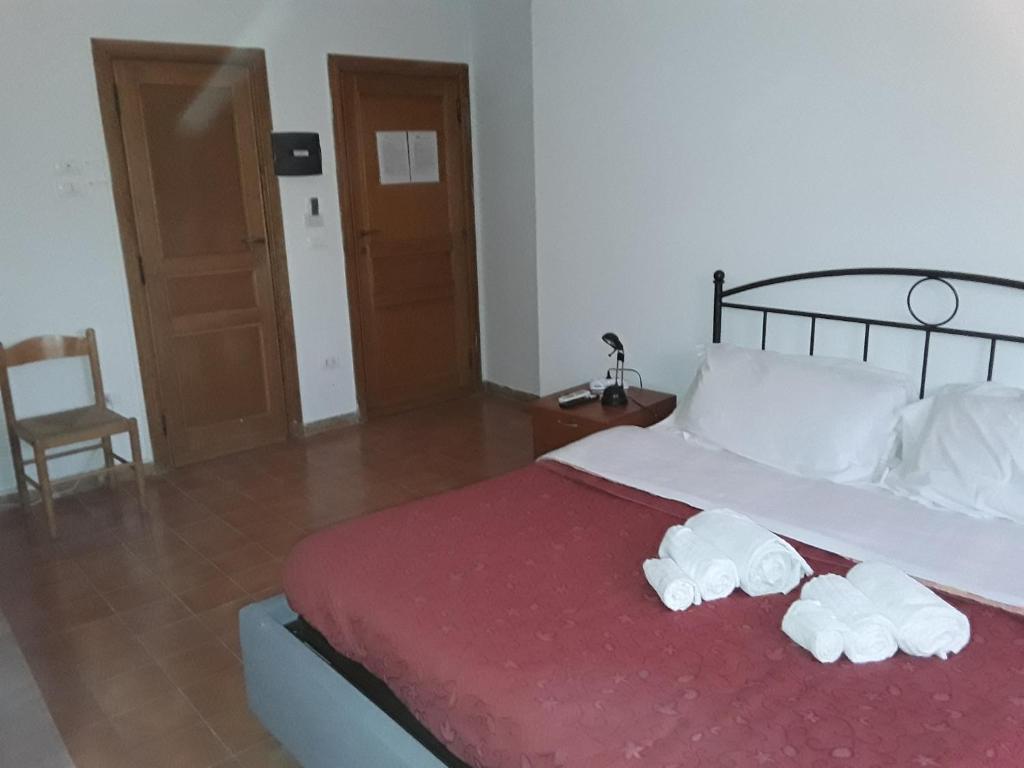 Postel nebo postele na pokoji v ubytování L'Aragosta Guesthouse