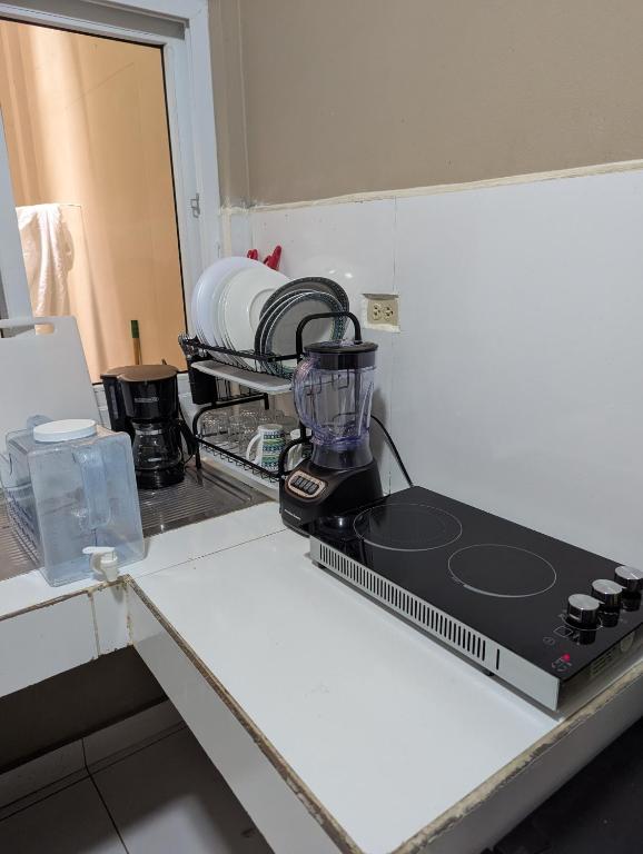 Kuchyň nebo kuchyňský kout v ubytování 5 minutos de UNITEC Apartamento completo de un cuarto
