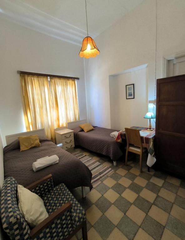 Postel nebo postele na pokoji v ubytování Trianon