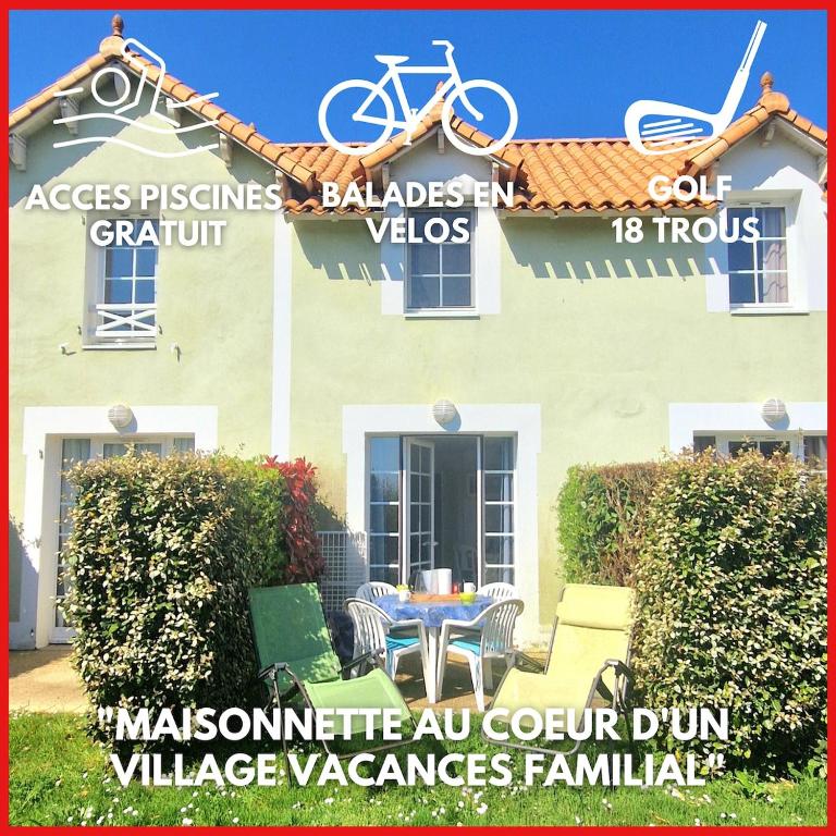 une pancarte pour une maison avec un vélo dessus dans l'établissement 