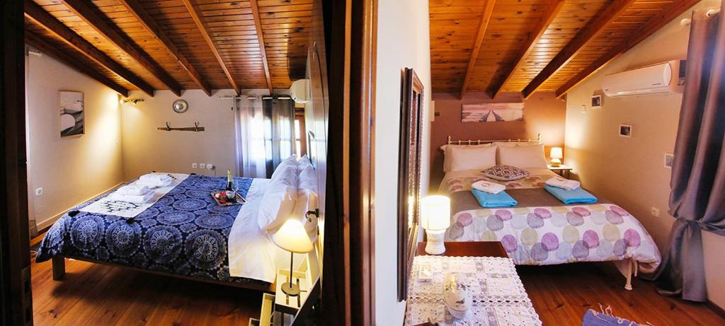 A bed or beds in a room at Venetis Luxury Apartments