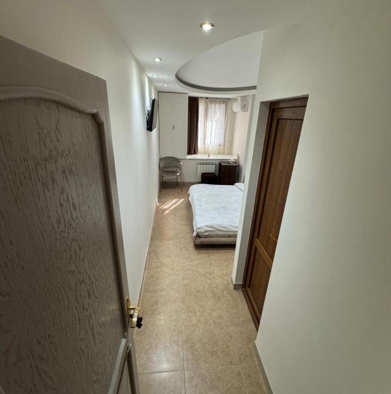 Postel nebo postele na pokoji v ubytování Time Hotel Yerevan