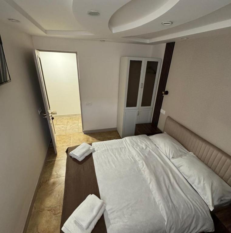 Postel nebo postele na pokoji v ubytování Time Hotel Yerevan