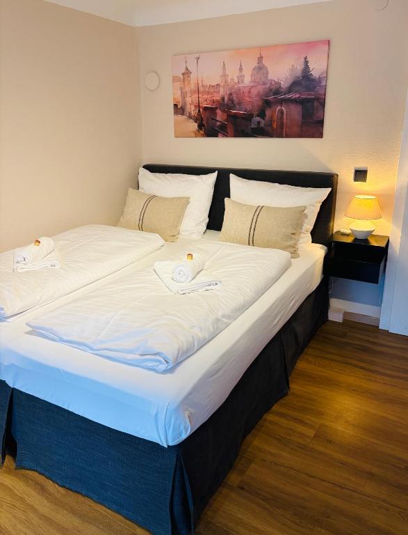 Postel nebo postele na pokoji v ubytování APT. STONE-LODGE