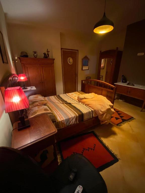 Postel nebo postele na pokoji v ubytování TreeHouse Room