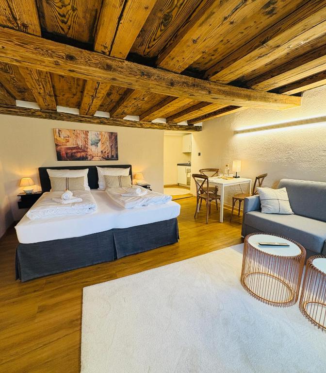Postel nebo postele na pokoji v ubytování APT. STONE-LODGE