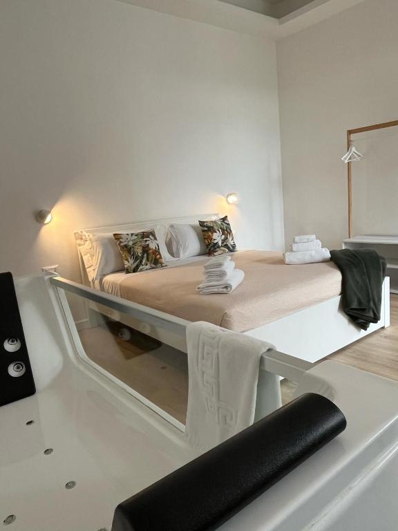 Postel nebo postele na pokoji v ubytování 20 Settembre Rooms