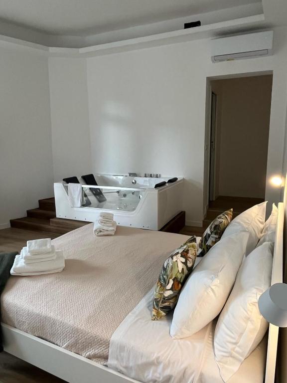 Postel nebo postele na pokoji v ubytování 20 Settembre Rooms