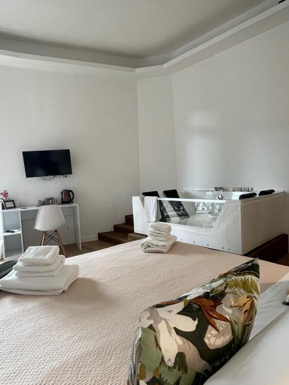 TV a/nebo společenská místnost v ubytování 20 Settembre Rooms