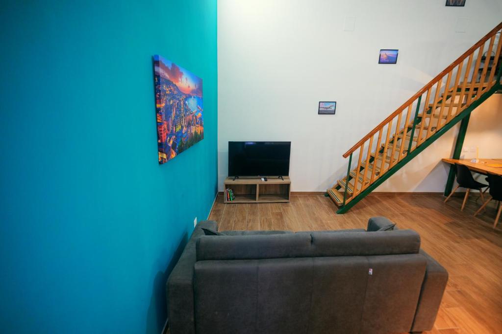 TV a/nebo společenská místnost v ubytování Terminal 1 Guest House