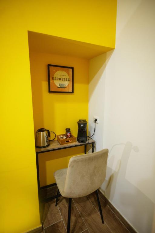 Příslušenství pro přípravu čaje a kávy v ubytování Terminal 1 Guest House