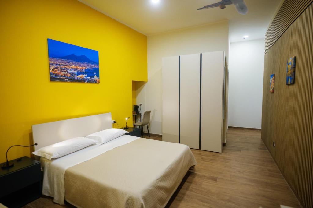 Postel nebo postele na pokoji v ubytování Terminal 1 Guest House