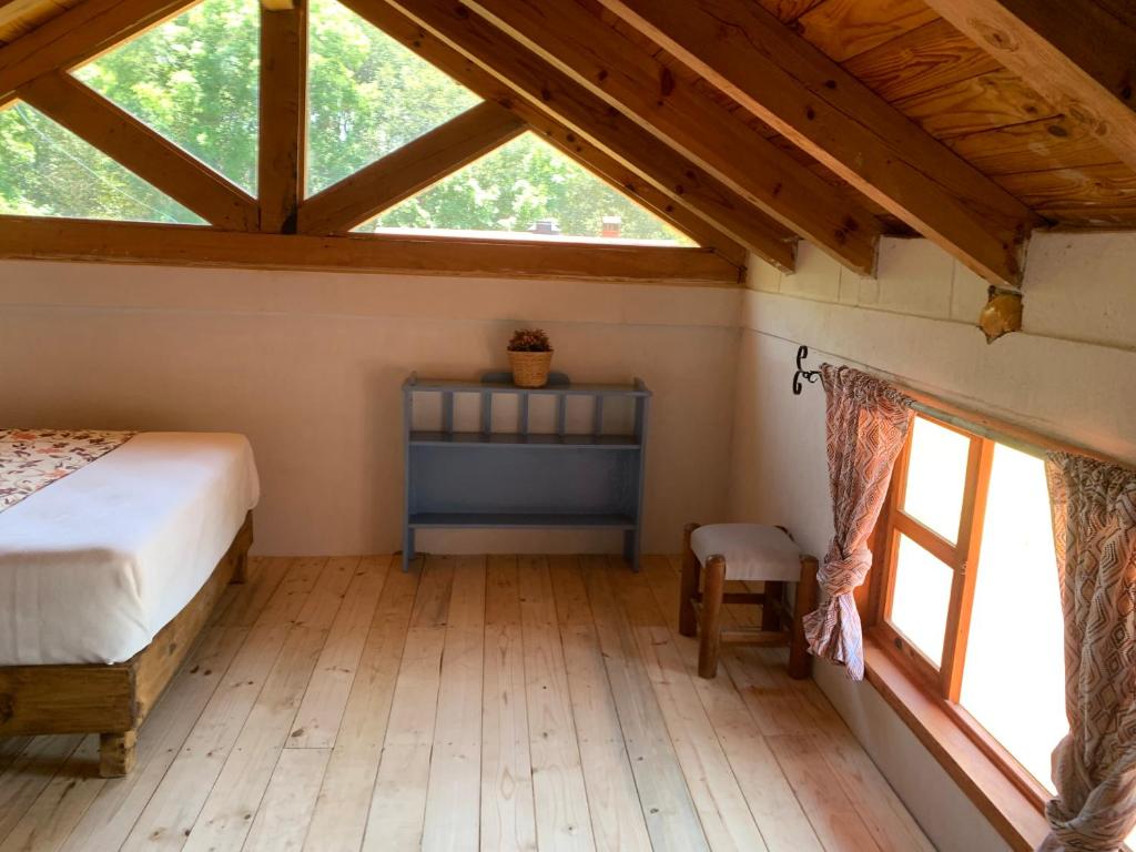 Postel nebo postele na pokoji v ubytování Cabañas los cactus 2