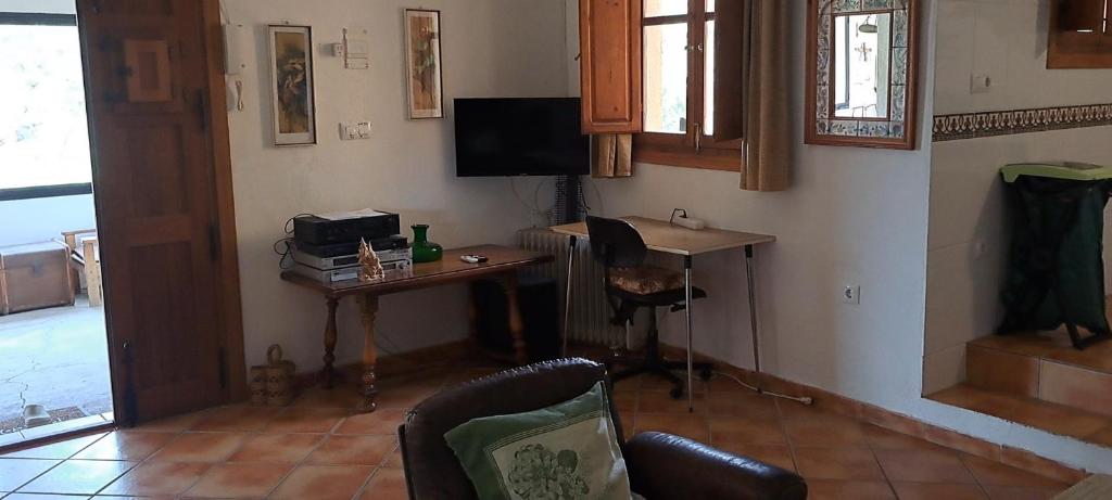 Televízia a/alebo spoločenská miestnosť v ubytovaní Casa Sol y Vida Tabernas
