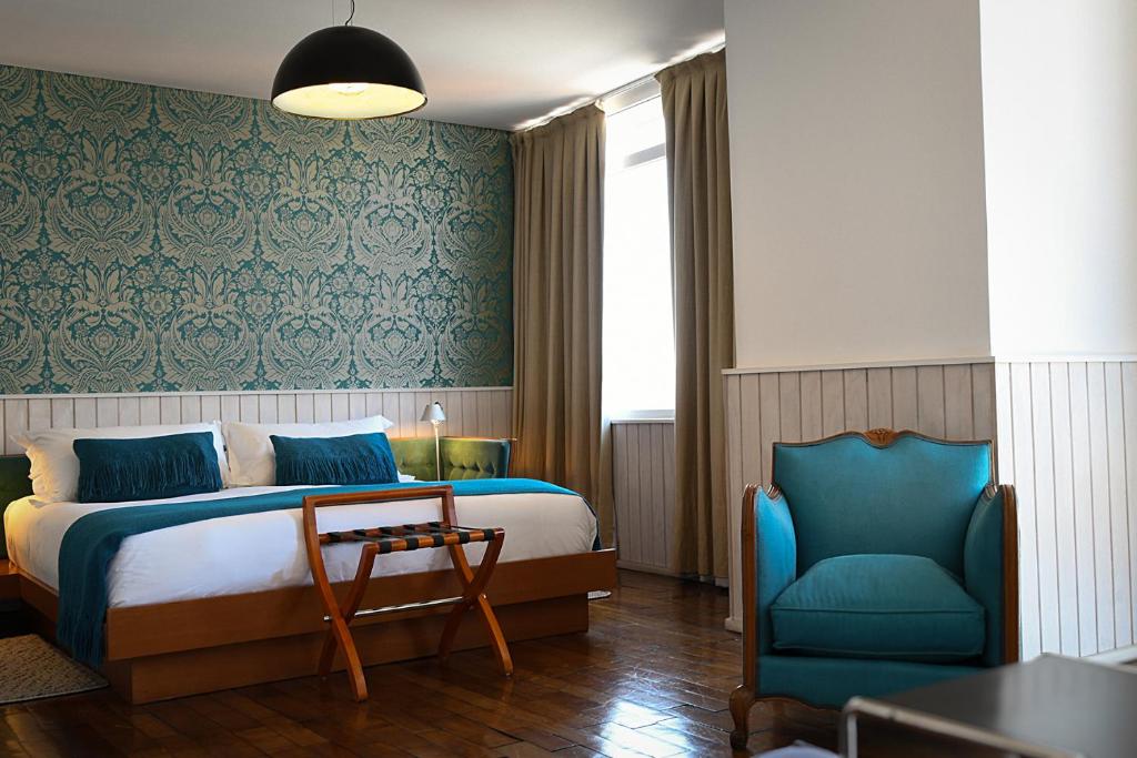 Postel nebo postele na pokoji v ubytování Palacio Astoreca