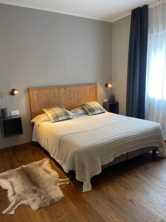Postel nebo postele na pokoji v ubytování Condhotel Fanti