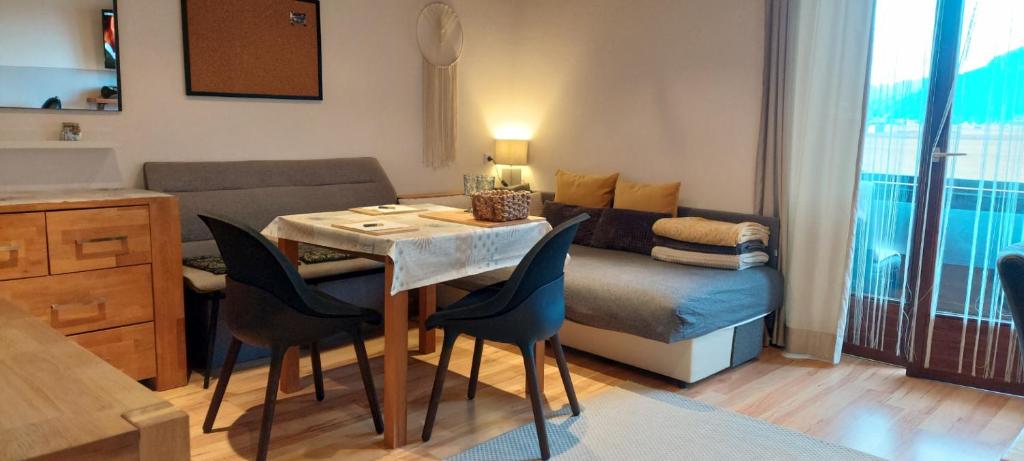 Posezení v ubytování Abis Ferienwohnung Salzkammergut