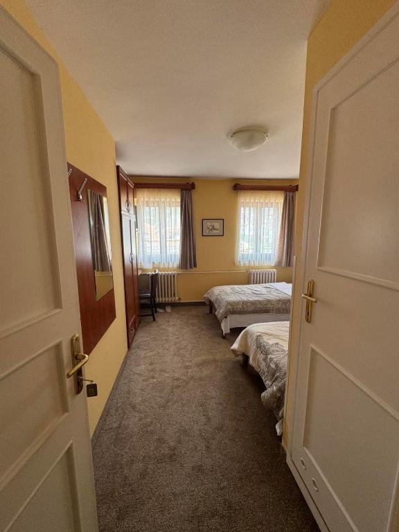 Postel nebo postele na pokoji v ubytování Ada Apartments