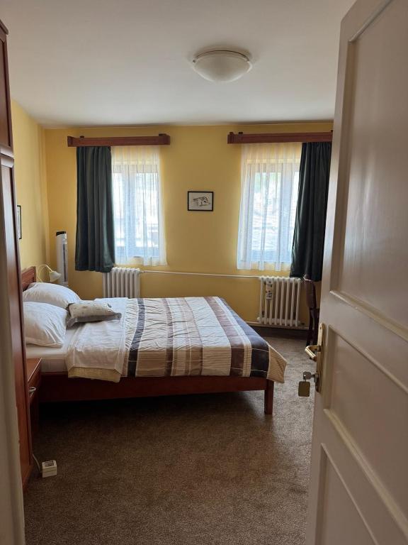Postel nebo postele na pokoji v ubytování Ada Apartments