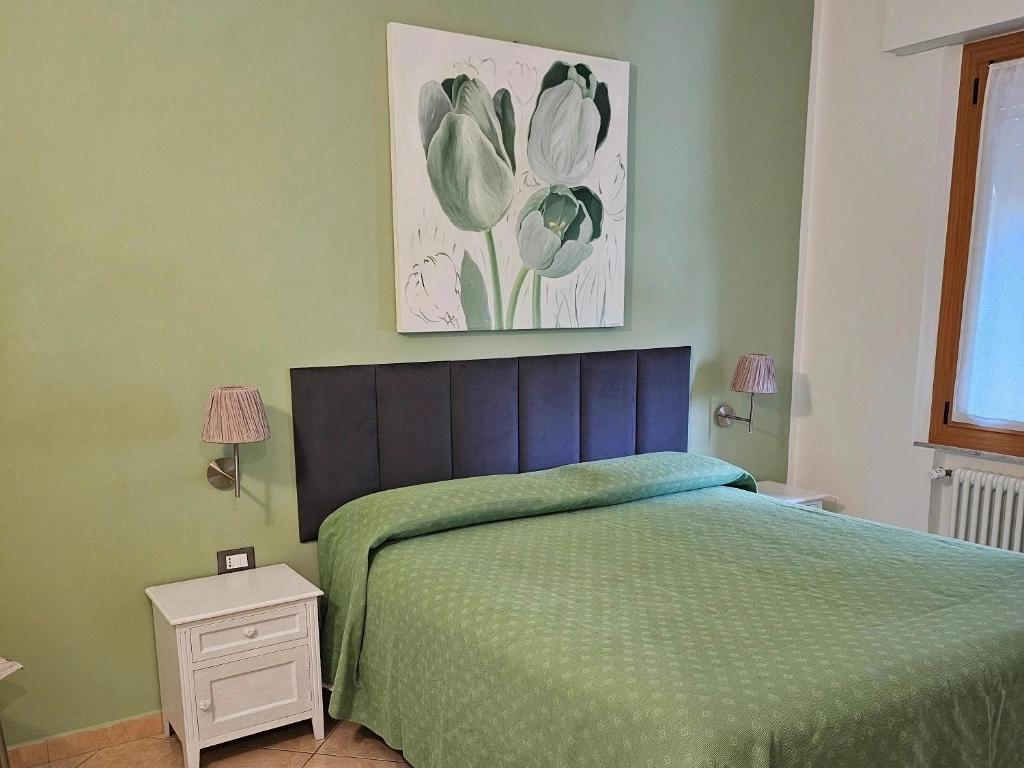 Postel nebo postele na pokoji v ubytování Guest house Il Giardino in Città