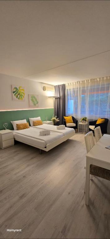 Postel nebo postele na pokoji v ubytování Residenza Lago di Lugano