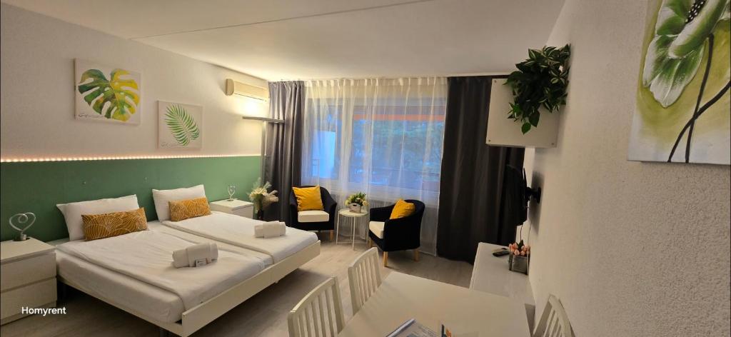 Postel nebo postele na pokoji v ubytování Residenza Lago di Lugano