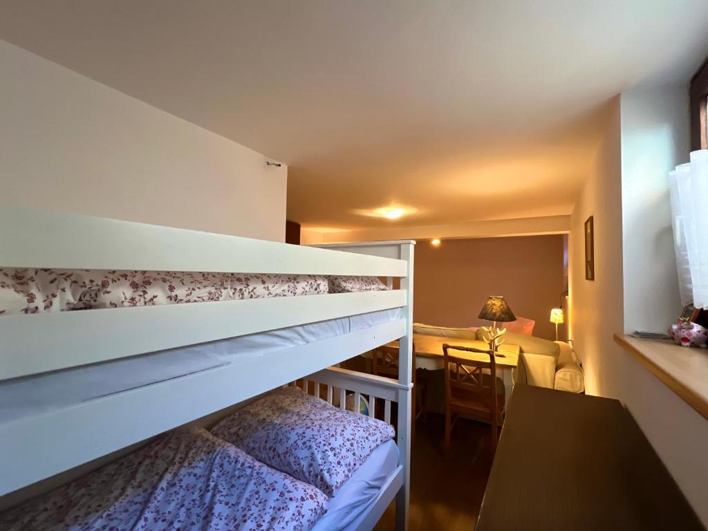 Postel nebo postele na pokoji v ubytování Chalet Aurach