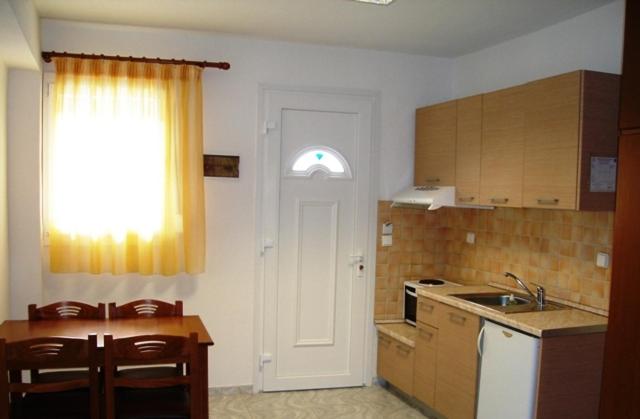 Kuchyň nebo kuchyňský kout v ubytování Asterias Hotel