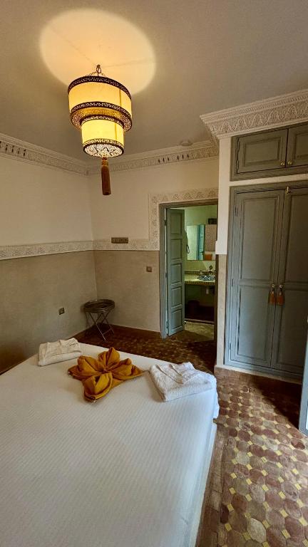 Postel nebo postele na pokoji v ubytování Riad Magnolia&SPA